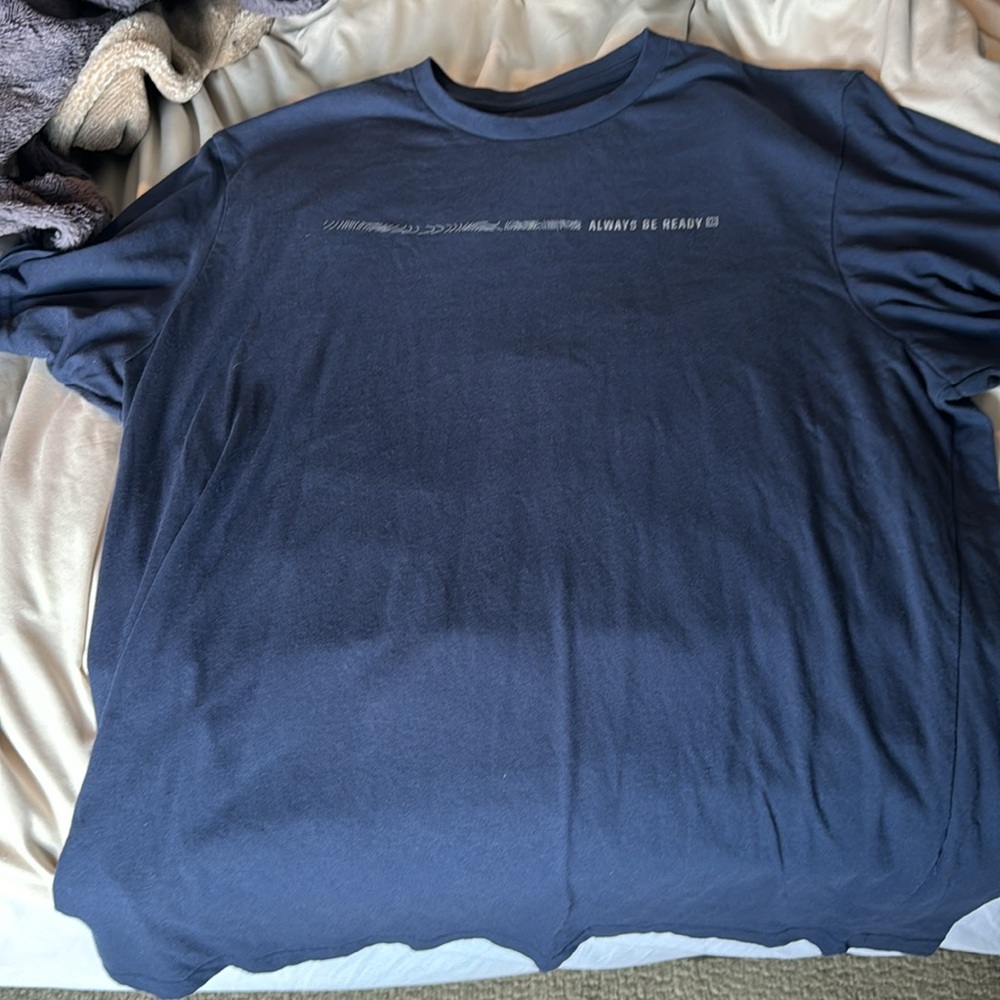 5.11 Tactical shirt.. shirt is basically brand new but has hole in side - Picture 2 of 5